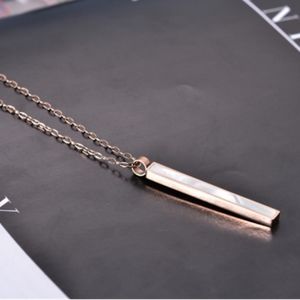 Minimalist 18k gold shell pillar necklace